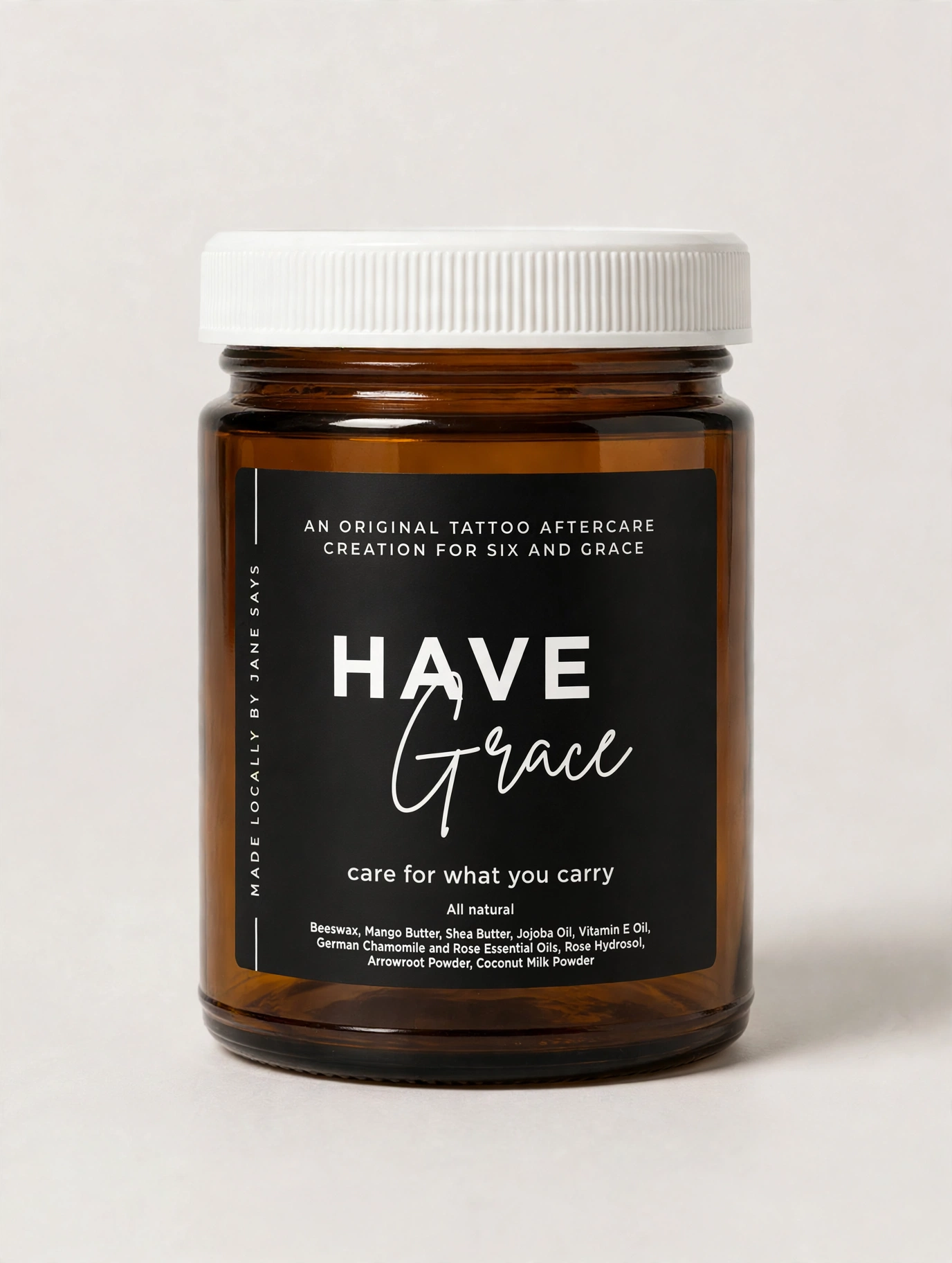 Closed amber jar of Have Grace tattoo aftercare